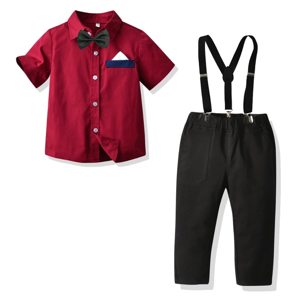 Traje de niño, traje de pantalón negro, camisa roja manga corta y detalles de pañuelo azul con blanco, tirante y corbatín negro