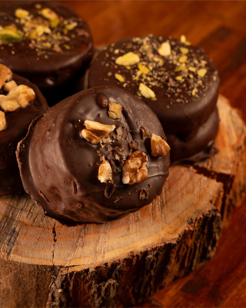 Alfajor de dulce de leche + choco negro