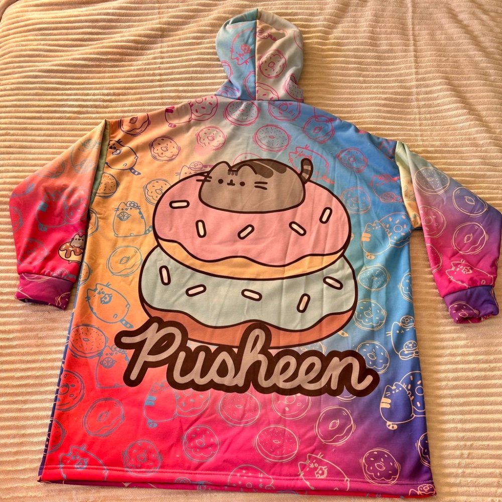 MANTA BUZO ADULTO PLUSH CON CAPUCHA PUSHEEN